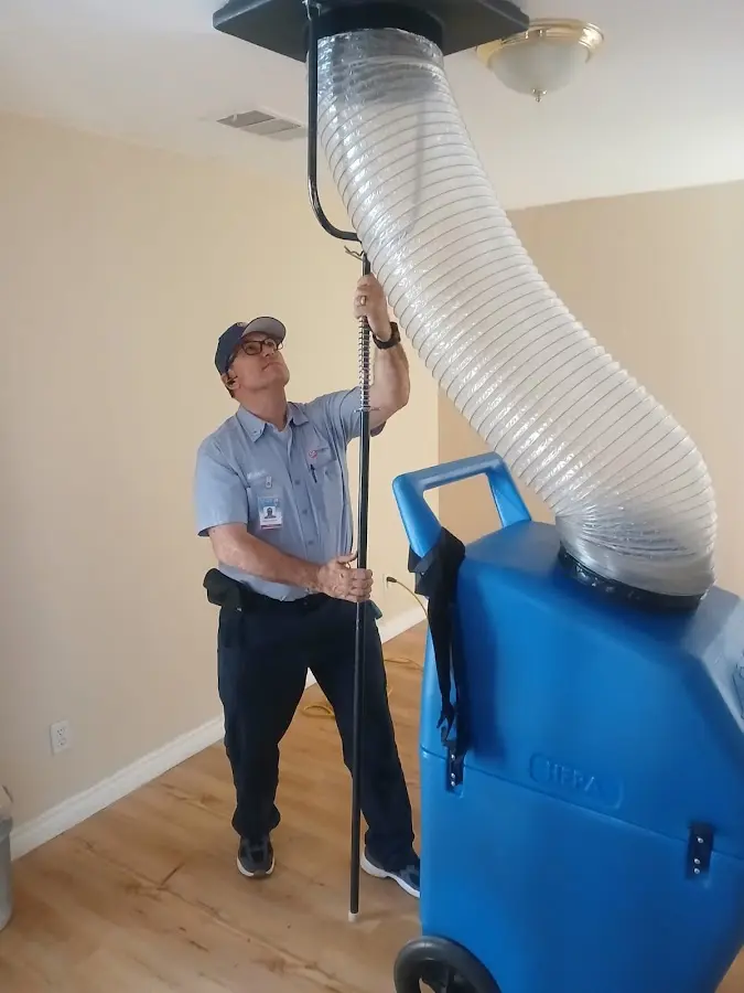 HVAC Installation technician using HEPA equipment in Dickson